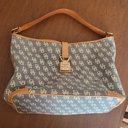 Vtg Dooney & Bourke Signature Shoulder Hobo Satchel Tote Handbag  
Leather Trim.
Pre-owned, good shape, please see the photos.
It has pen's marks insi