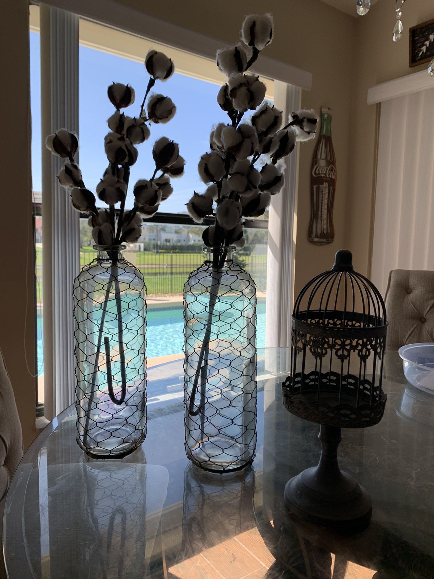 Farmhouse decor: glass vases, candle holder, cotton