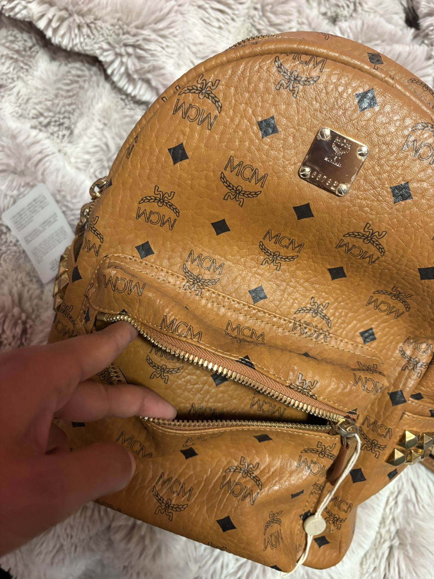 Both MCM backpacks