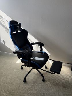 Pretty New Black and Blue Gaming Chair with Footrest