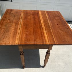 Table with folding sides
