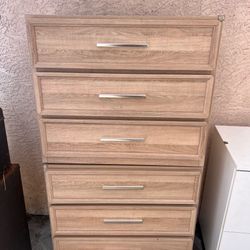 2  drawer night stand. Tan wood