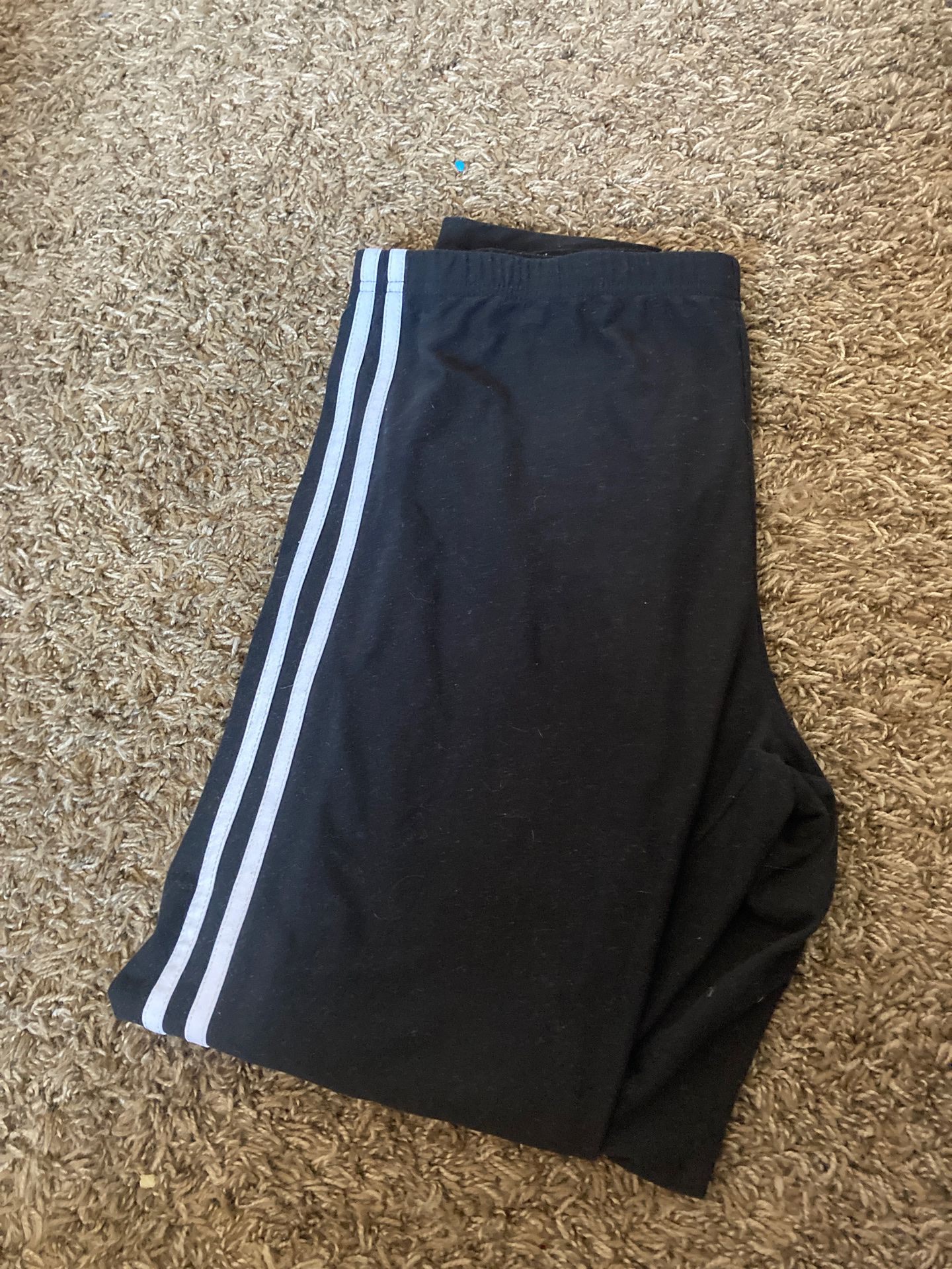 Black leggings with two white lines down leg size extra-large