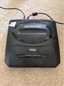 SEGA Genesis with two games