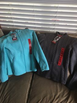 Women’s medium Spyder Sweater Jackets