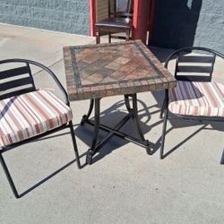 Two chairs and table