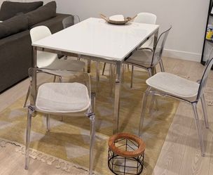 White Dining Table and 4 clear acrylic/lucite dining chairs