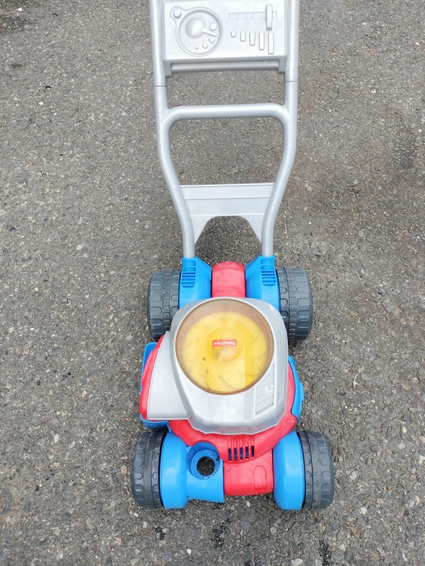 A Little Kids Lawn Mower