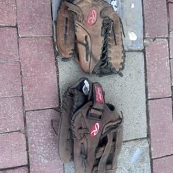 Pair Of Rawlings Gold Glove Series Adult Size 