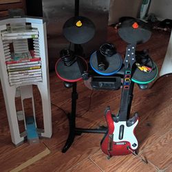 Nintendo Wii Games & Accessories W/ Rock Star Guitar & Drums.