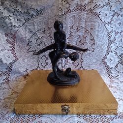 Cast Iron Statue Of Two Boys Playing Jumping.