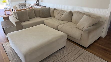 Sectional Sofa with seat covers.