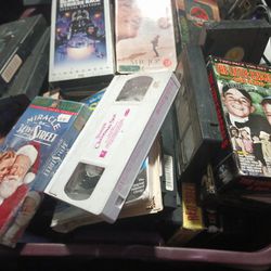 VHS Movies And Other Items Look Through The Pictures