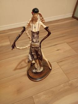 Local taxes included (where applicable)
A. Santini Art Deco Flapper Lady Diva Figurine – Glamorous 1920s Sculpture with Fur Stole & Cigarette Holder
C