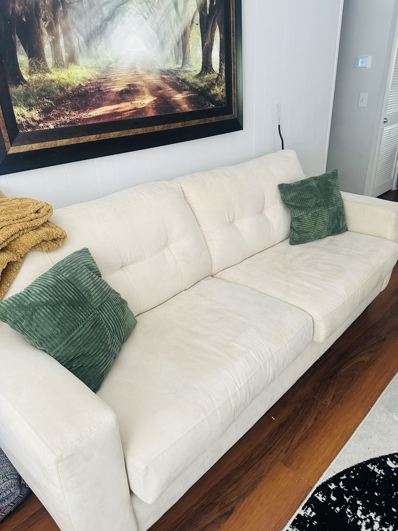 Lovely Cream Couch And Ottoman
