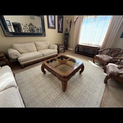 White couches and brown table set