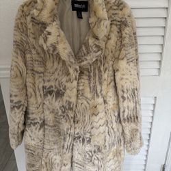 Women’s like new size small Metrostyle faux fur in cream &brown coat