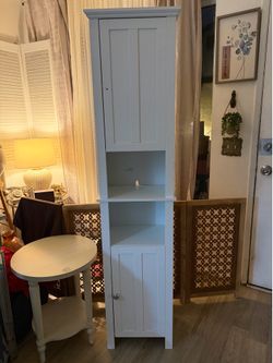 White bathroom storage cabinet
