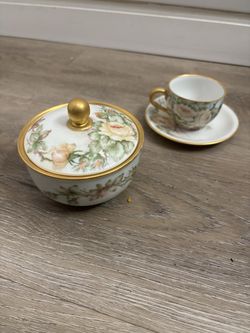 Hand painted porcelain tea cup and sugar bowl