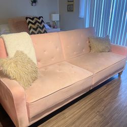 Pink Futon Couch With Gold Accents