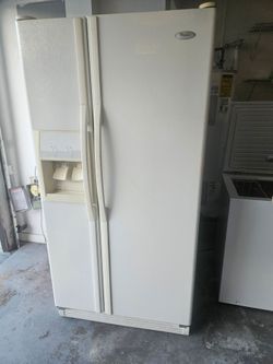 Refrigerator whirlpool. side by side