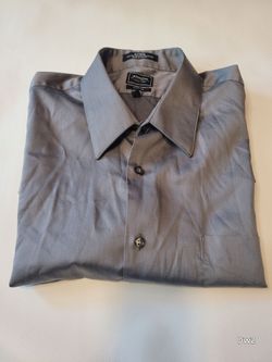 gray, fitted sateen shirt from Arrow features a pointed collar and long sleeves