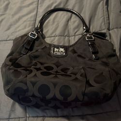 COACH-black canvas shoulder bag from the Coach Madison collection