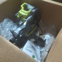 BRAND NEW RYOBI MITRE SAW 7-1/4 WITH BLADE