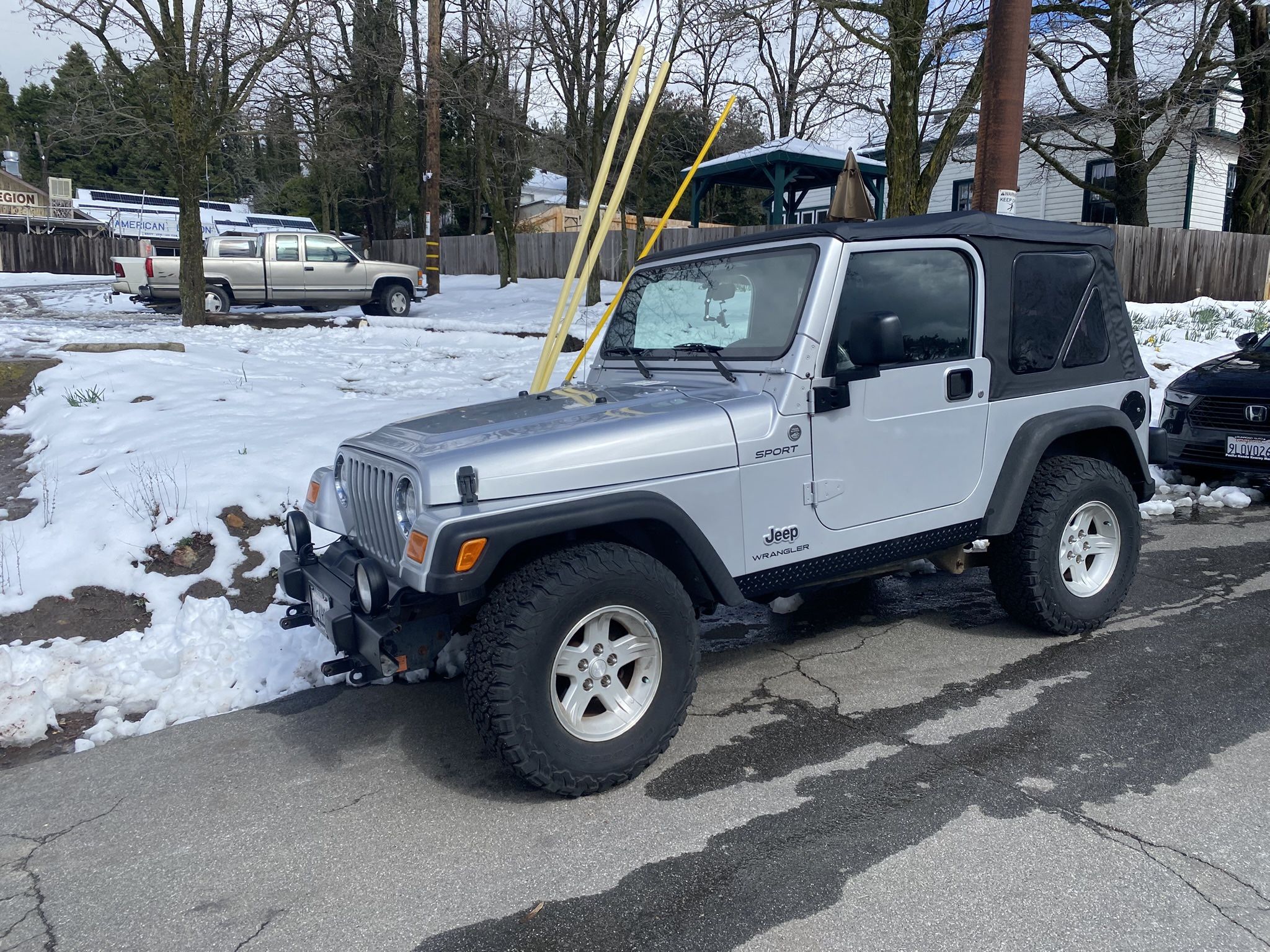 Jeep Wrangler sport gray, and color black vinyl top
