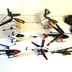 A35-247-  Parts Only-7-RC Helicopters and 4- Remote Controls 