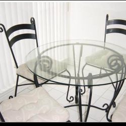 Pier 1 import dinning set  Glass table with 4 chairs