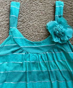 Green striped tank top with flower detail #stripes