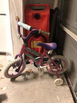 Little Girl’s Huffy Pink And Purple Hearts Bike