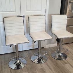 3 Adjustable Height Swivel Stools. Can be used for counter or bar stools. Used, in good condition. 

$195 for set of 3 