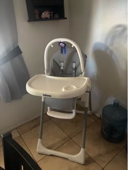 Grey and white high chair