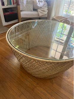 Round coffee table with glass on top Round coffee table with glass on top