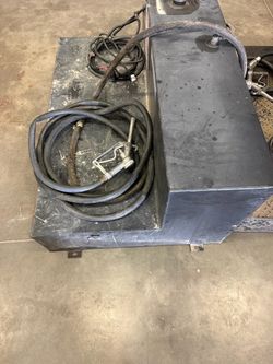 fuel tank with hose and pump