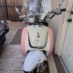 Amigo bello pink scooter