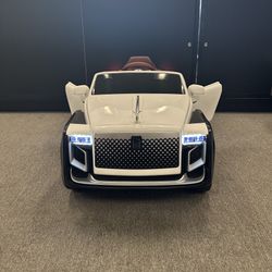 Brand New Power Wheel Ride On Rolls Royce Car For Kids.