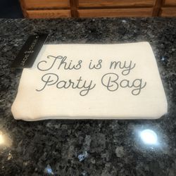 Brand New Bag : Makeup Bag.  Says” This Is My Party Bag”.  Size 8 inches Wide And 5 1/2 inches Long 