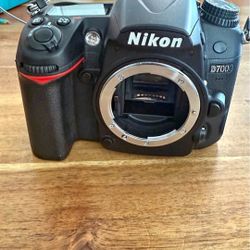 Nikon D7000 with Nikor 50mm f1.8 lens & Nikon 18-55mm f3.5-5.6 lens.