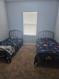 2 Twin  size bed frames and mattress