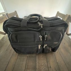 Tumi expandable laptop bag, in used condition.  