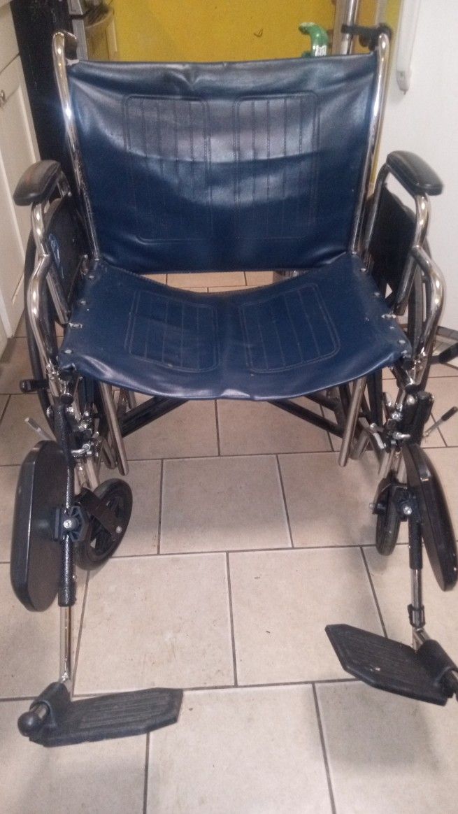 Wheelchair With Oxygen Rack On Back