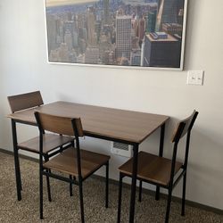 table with three chairs