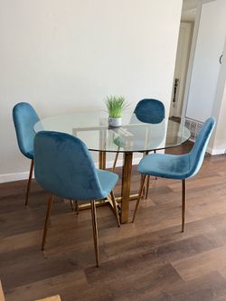 Glam Style Dining Table with Gold Legs and Chairs