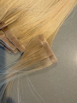 Tape in 100% hair extensions