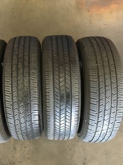three 2157015 used tires