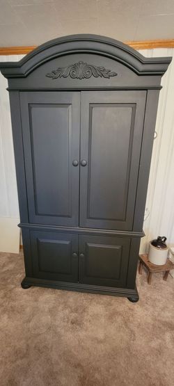 Dark Gray Wood Armoire with Carved Detail