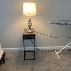 Table With Cellphone Connection And Lamp